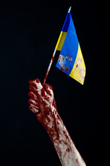 Bloody hands, the flag of Ukraine in the blood, revolution