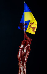 Bloody hands, the flag of Ukraine in the blood, revolution