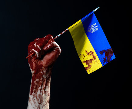 Bloody hands, the flag of Ukraine in the blood, revolution