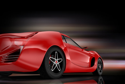 Rear view of red sports car on black background