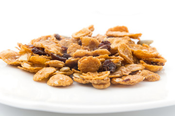 cornflakes and caramel isolated on white background