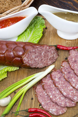 sausage on a wooden plate in a restaurant