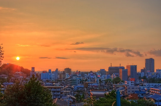 Sunset over city skyline with Okazaki Castle at dusk, Okazaki, Chita, Japan
