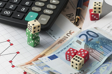 the stock market with finance graphs, coins and banknotes