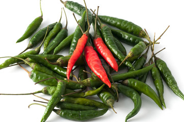 Red and green chili peppers isolated on white background.