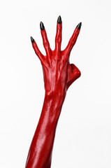 Red Devil's hands, red hands of Satan, white background isolated