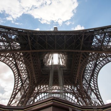 France, Paris, Upward view of Eiffel Tower against sky