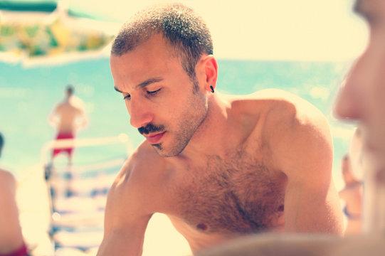 Italy, Sardegna, Oristano, San Giovanni di Sinis, Man on beach