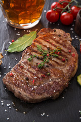 Beef steak on wooden table