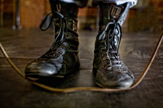USA, Colorado, Mesa County, Grand Junction, Boxers shoe detail with jump rope