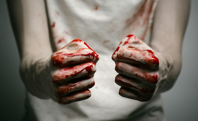 murderer shows bloody hands and experiencing depression and pain