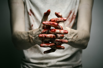 murderer shows bloody hands and experiencing depression and pain