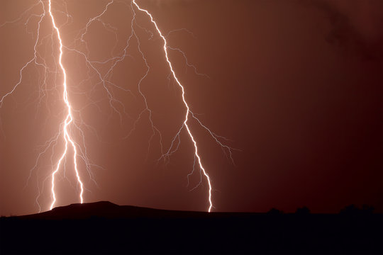 USA, Arizona, Arlington, Thunder bolt over Dixie Hill