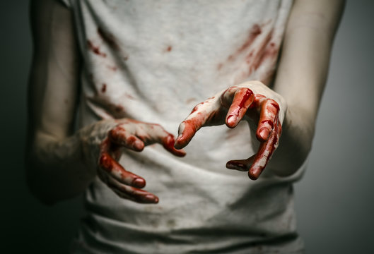 murderer shows bloody hands and experiencing depression and pain