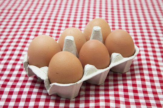 six eggs in a carton