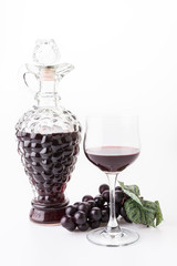 Red wine and grapes