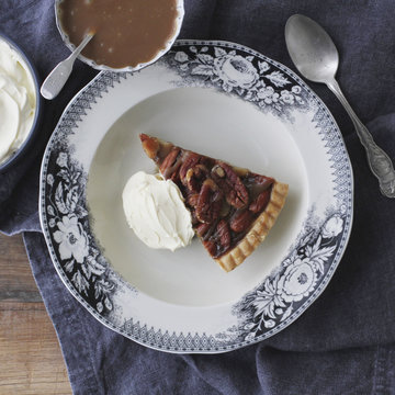 Pecan pie on china plate