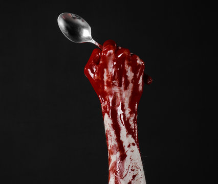 bloody hand holding a spoon, fork, bloody spoon, fork, isolated