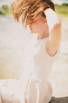 Teenage girl (14-15) with obscured face