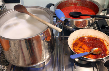 pots on the stove in the kitchen during lunch preparation