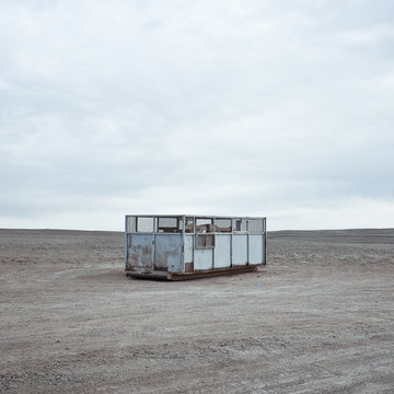 USA, Wyoming, Garbage container on prairie