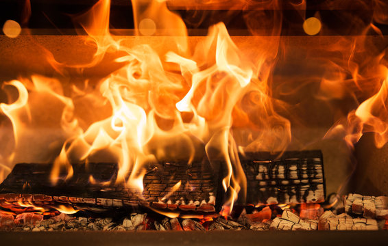 Full frame close-up of a fire burning in a fireplace