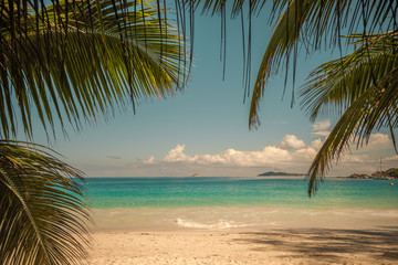 Fototapeta na wymiar Retro style image of tropical island beach