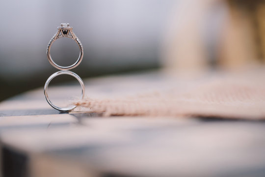 Wedding rings atop each other