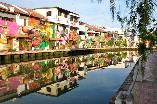 Malaysia, Melaka State, Malacca, Graffitied buildings on riverbank