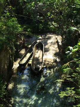 Mexico, Tulum, Wooden boat by river