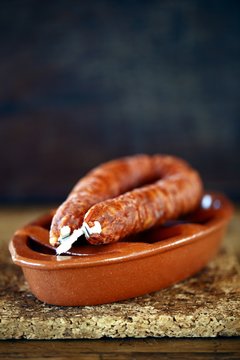 Portugal, Alentejo, Chorizo on clay bowl