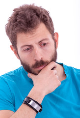 Fototapeta premium Smiling young man with beard posing