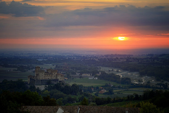 Italy, Parma, Elevated view of Torrechiara Castle at sunrise
