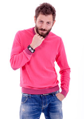 Smiling young man with beard posing