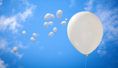 White Balloons on Sky Background