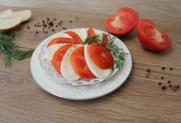 Caprese salad with tomatoes, mozzarella