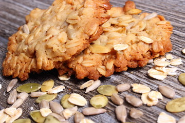 Oatmeal cookies on wooden background