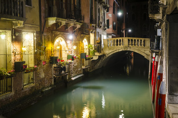 Fototapeta na wymiar Canal in Venice at night, Italy