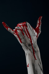 horrible zombie demon bloody hands on a black background