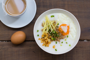 Congee of traditional food Chinese style with soft-boiled egg