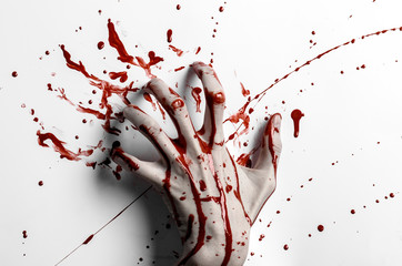 bloody hand print on a white leaves bloody wall studio isolated
