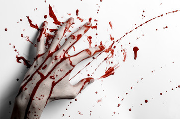 bloody hand print on a white leaves bloody wall studio isolated - obrazy, fototapety, plakaty