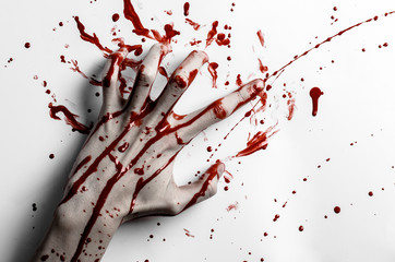 bloody hand print on a white leaves bloody wall studio isolated