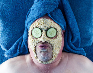 Man Getting Facial With Silly Facial Expression