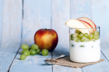 yogurt greek cup with fruit healthy food background