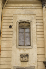 Vintage window on a church in Lviv