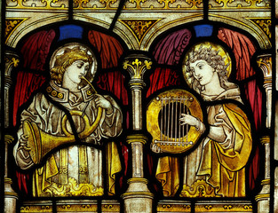Angels making music in stained glass - obrazy, fototapety, plakaty