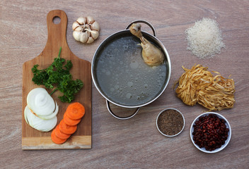 Chicken soupwith fresh vegetables, noodles and beans