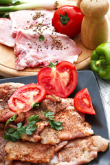 the preparation of meat and vegetables for a meal