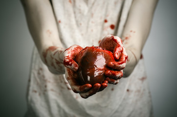 crazy killer keeps bloody hands torn bloody human heart